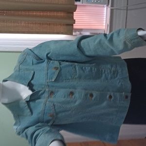 Woman's Denim Jacket With 6 Front Buttons And Two Pockets